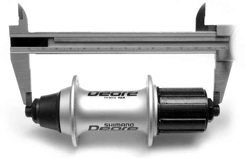 Measuring OLD Nuts holding the hub in place and the axle width are not measured. Only the distance that stays inside the frame dropouts.