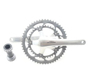 Shimano crankset with BB bearings (to the left). This type has axle attached directly to the crank arms, going through the bearings. Detailed explanation of BB types in a separate post.