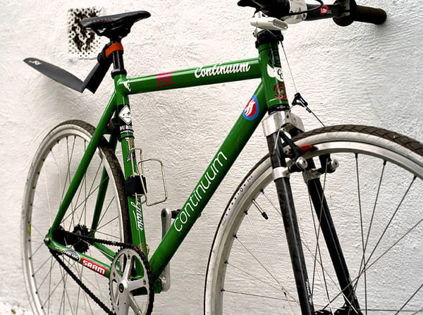 Bike with cantilever brakes. Brakes are fastened to fork mounts.