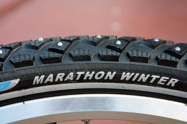 Tyre with small knobs and studs. Very good for ploughed roads and ice.