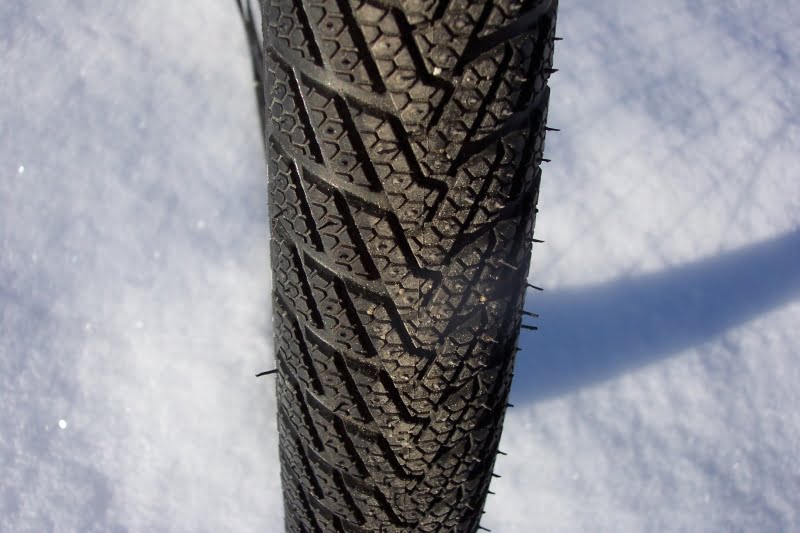 Tyre with fine tread pattern without studs.