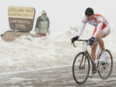 A bit extreme example, but it explains the point. The man standing is freezing in big jacket, while pedalling keeps the cyclist warm. Crucial parts are covered: head, torso, hands and feet.