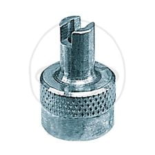 Schrader (auto) valve removal tool. It is screwed on the valve as a regular valve cap, while the pointy upper part can be used to unscrew and remove the valve core when needed.