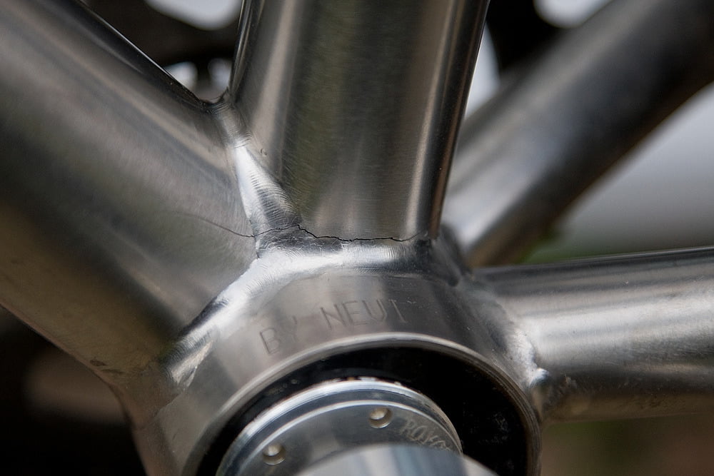 Cracked frame. Cracks often occur near welds.