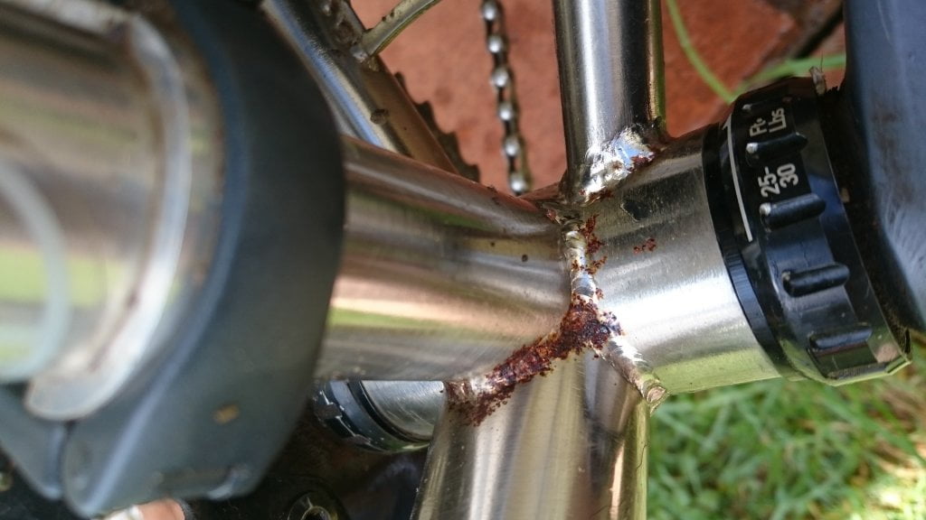 Steel frame that has started to rust. Better to avoid it.