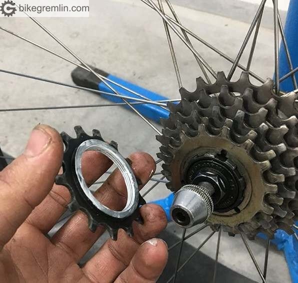 Shimano Uniglide freehub and cassette. The smallest sprocket tightens the cassette in place and acts like a locknut.