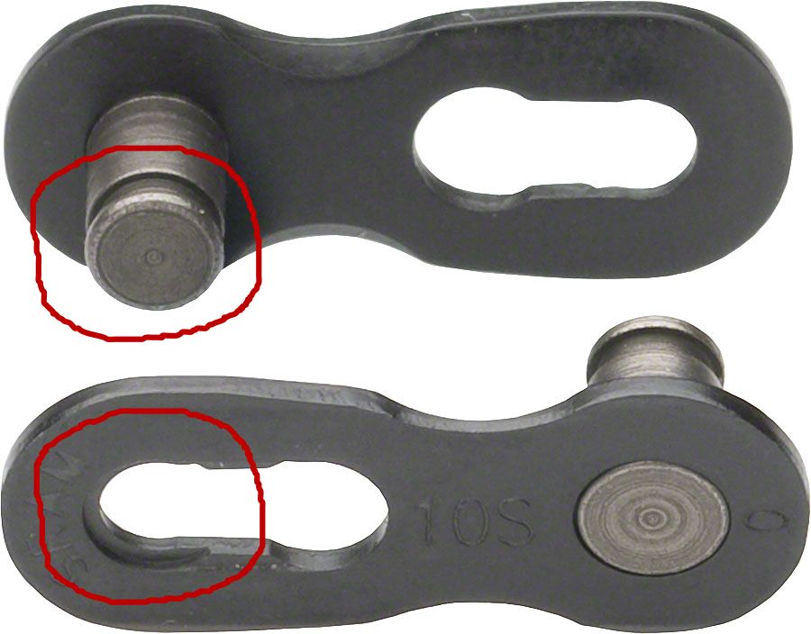Bicycle chain quick connect link. Pins of the link slide into the marked groove, locking it in place