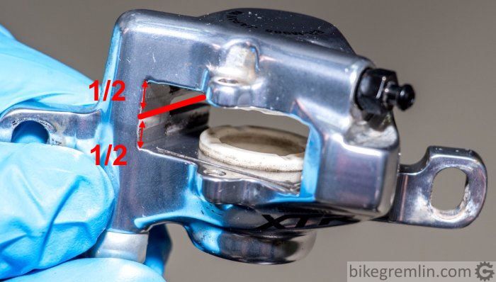 Do not move pistons out beyond half the caliper piston/pad opening width