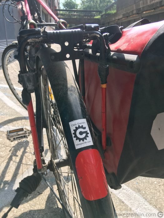 backpack on rear bike rack