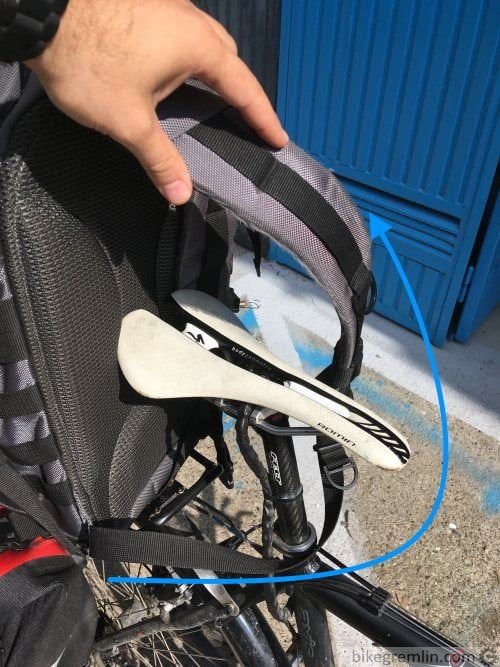 Strap backpack shop to bike rack