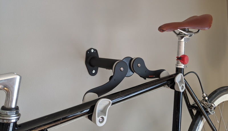 Ibera bicycle wall mount hanger - with a bicycle hung from the top tube
