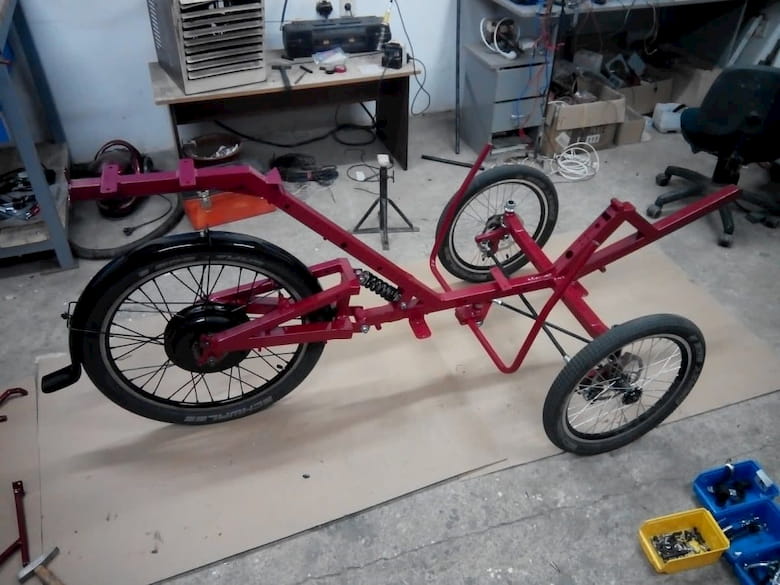 Frame with wheels mounted