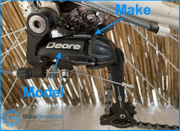 Make ("SHIMANO") and general model name ("Deore") of a bicycle rear derailleur